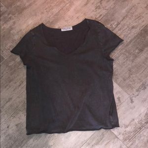 Grey tee shirt with undone hem